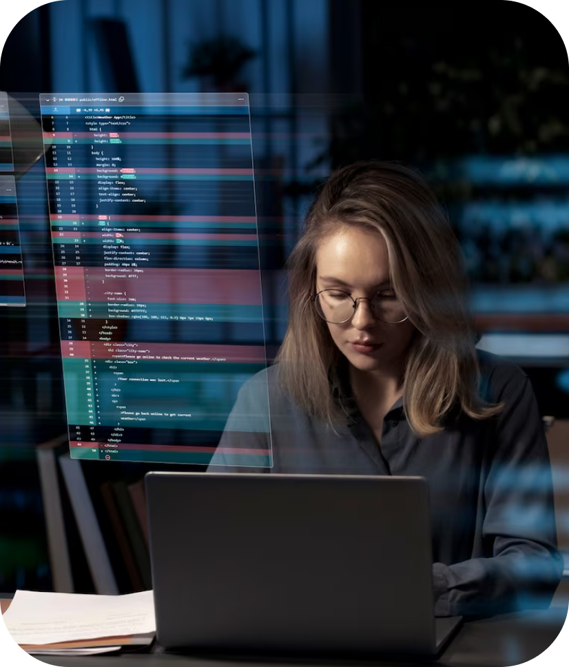 Donna che scrive su un notebook, con dati visualizzati accanto
